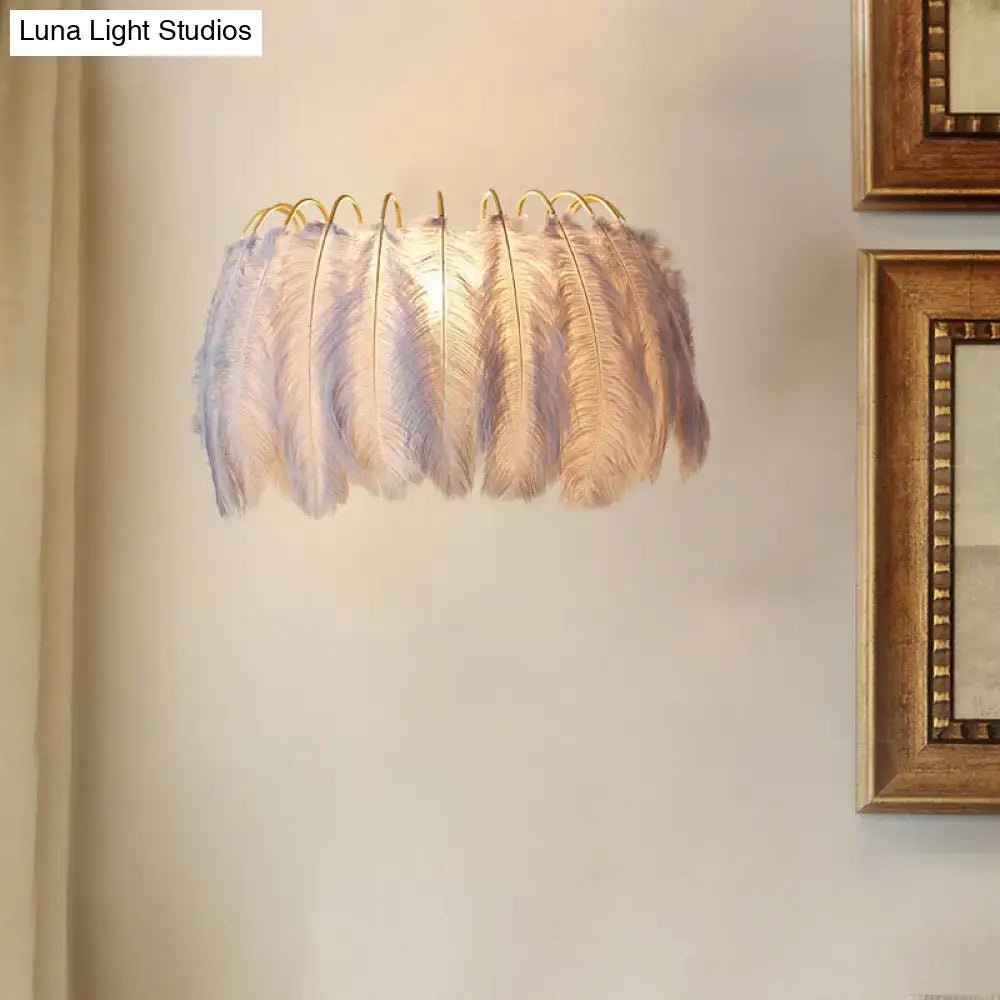 Modern style grey white sconce light featuring a cluster of soft gradient feathers for parlor wall decor