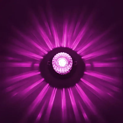 Modern sunburst crystal led flush mount ceiling light with crystal decorbites emitting vibrant purple rays for living room
