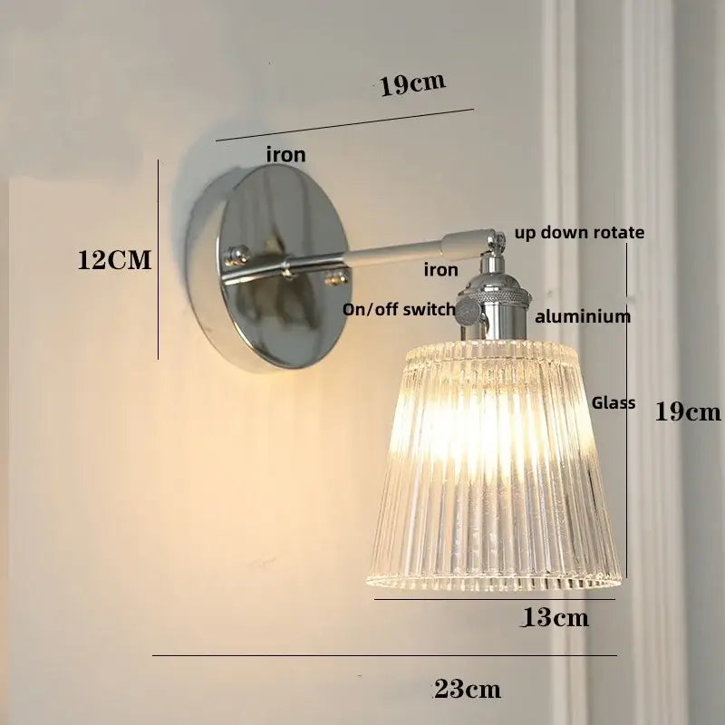 Modern sunrise iron ceramic led wall light with polished chrome iron ceramic base and clear ribbed glass shade decorbites iron ceramic wall light