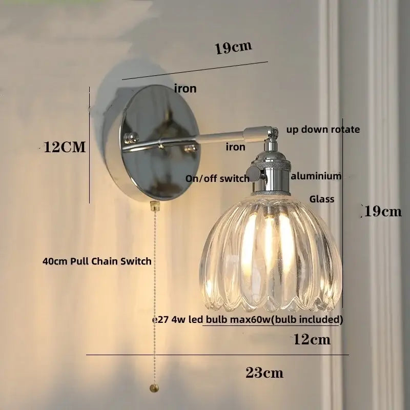 A vintage-style modern sunrise iron ceramic led wall light with clear ribbed glass shade and polished iron bracket for living room decorbites iron ceramic wall light