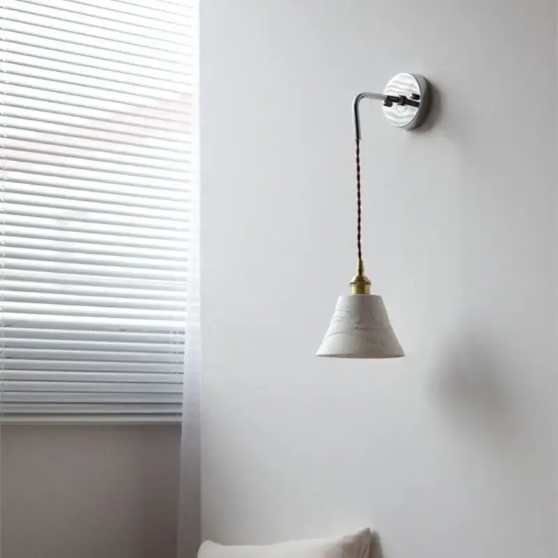 Modern sunset glass led wall sconce with white decorbites ceramic led bell pendant and brass finish for bedroom decor