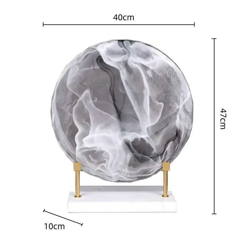 A sleek 40cm swirling gray and white glass geometric disk on a gold-toned stand for modern home decor figurines