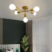 Modern symmetrical brass ceiling light with five white spheres in gold tone for living room decorbites brass ceiling light