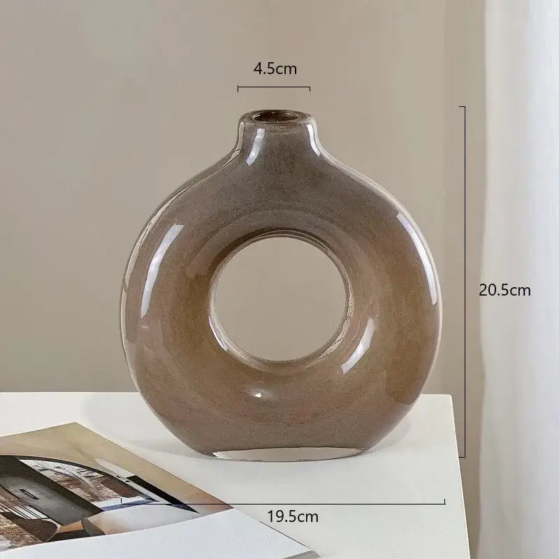 A sleek taupe glazed ceramic circles glass vase with modern geometric circles design for living room decorbites decor