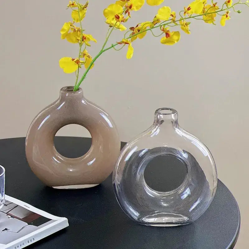 Two modern taupe ceramic and clear glass geometric circles glass vases with central hole for living room decorbites decor