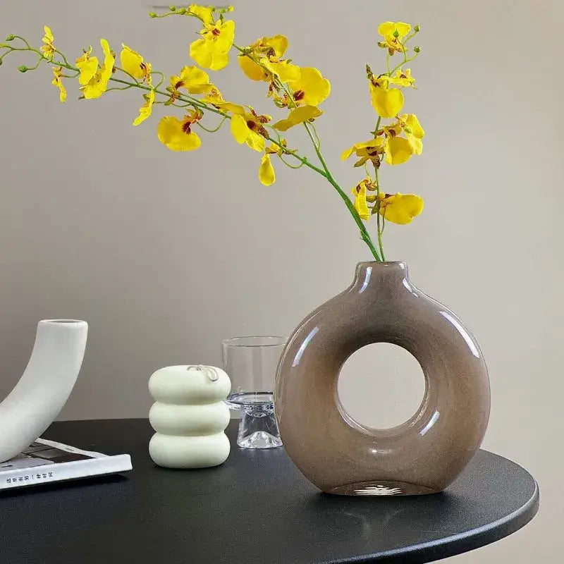 A sleek matte gray ceramic circles glass vase with geometric circles design for modern living room decorbites decor