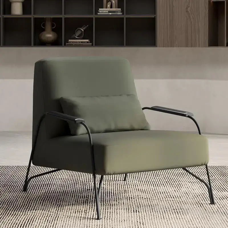 Modern taupe italian style single sofa chair in olive green upholstery with sleek black metal frame and matching cushion