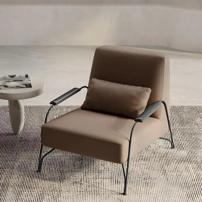 Modern taupe italian style single sofa chair with taupe upholstery, sleek black metal frame, and matching cushion