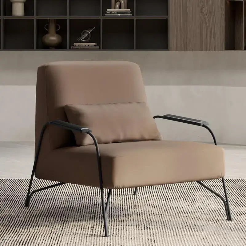 Modern taupe italian style single sofa chair with beige upholstered seat and sleek black metal frame for living room use