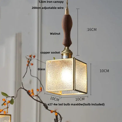 Modern teal and amber copper glass led pendant lamp with textured golden finish and dark walnut handle for dining room decorbites copper glass