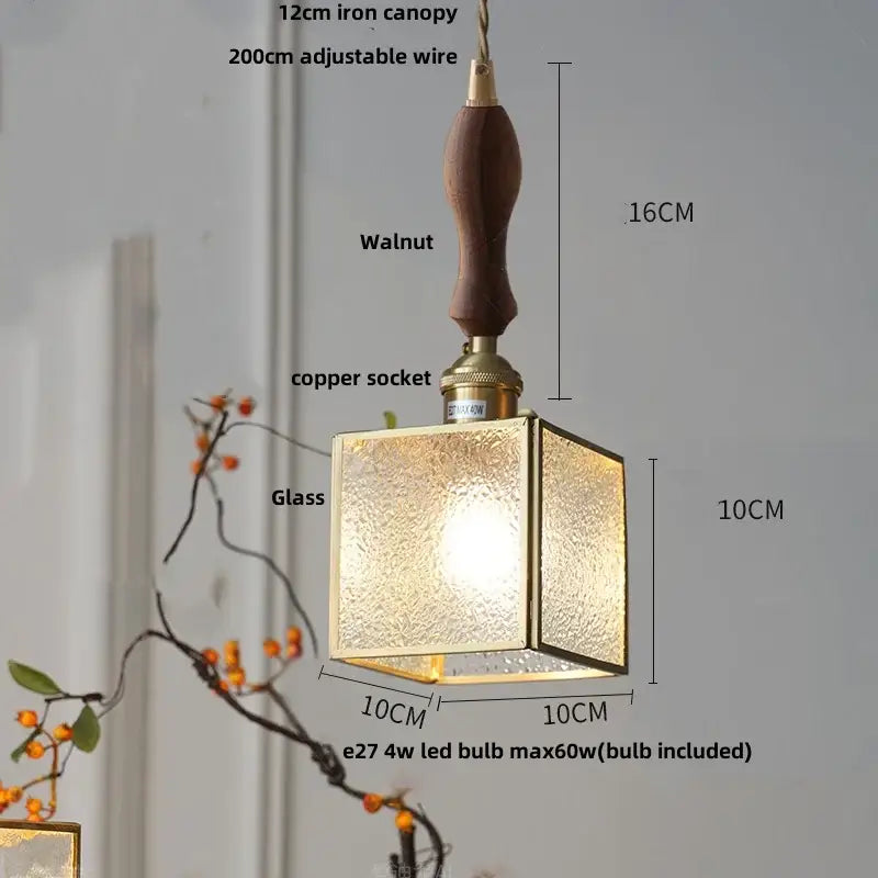 Modern teal and amber copper glass led pendant lamp with textured golden finish and dark walnut handle for dining room decorbites copper glass