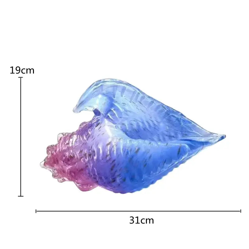 Modern teal and amber glass conch shell statue with translucent pink-to-blue iridescent finish for living room decor