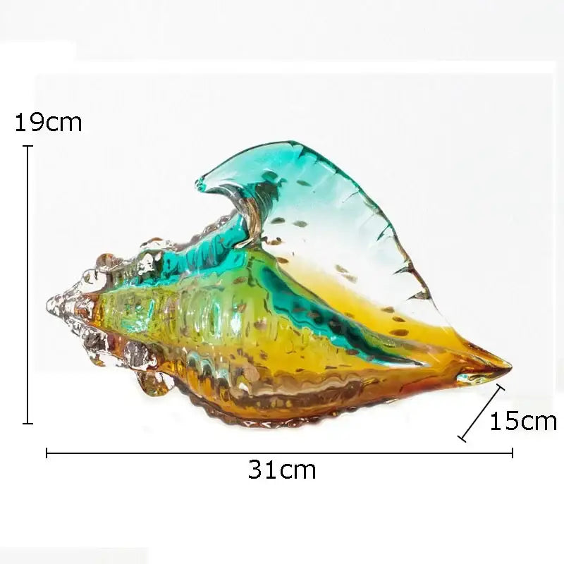 A vibrant hand-blown teal and amber glass conch shell statue for modern living room decor