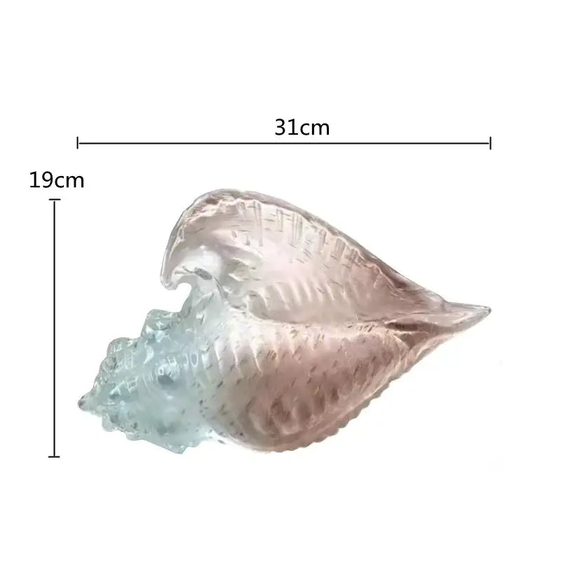 Translucent glass conch shell statue with light blue to soft pink gradient and intricate ridged detailing for living room decor