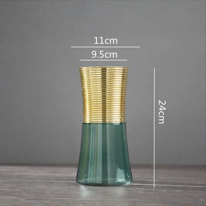 A sleek modern metal glass vase with a translucent teal body and a decorbites gold metal textured band for living room decor