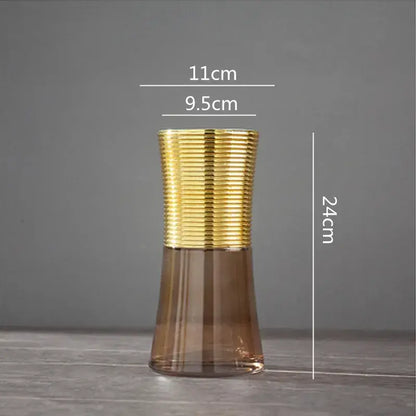 A modern teal and amber gold metal glass vase with a gold metal ribbed top for elegant living room decorbites decor