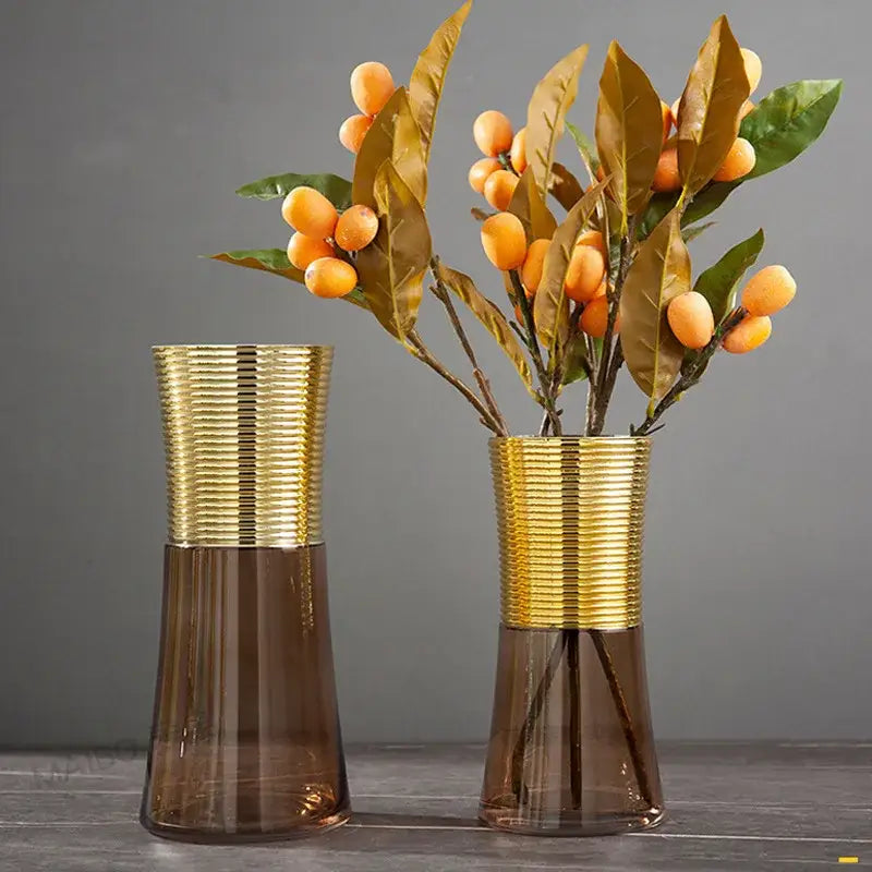 Tall slender metal glass vase with gold metal ribbed band and translucent amber base for living room decorbites gold metal decor