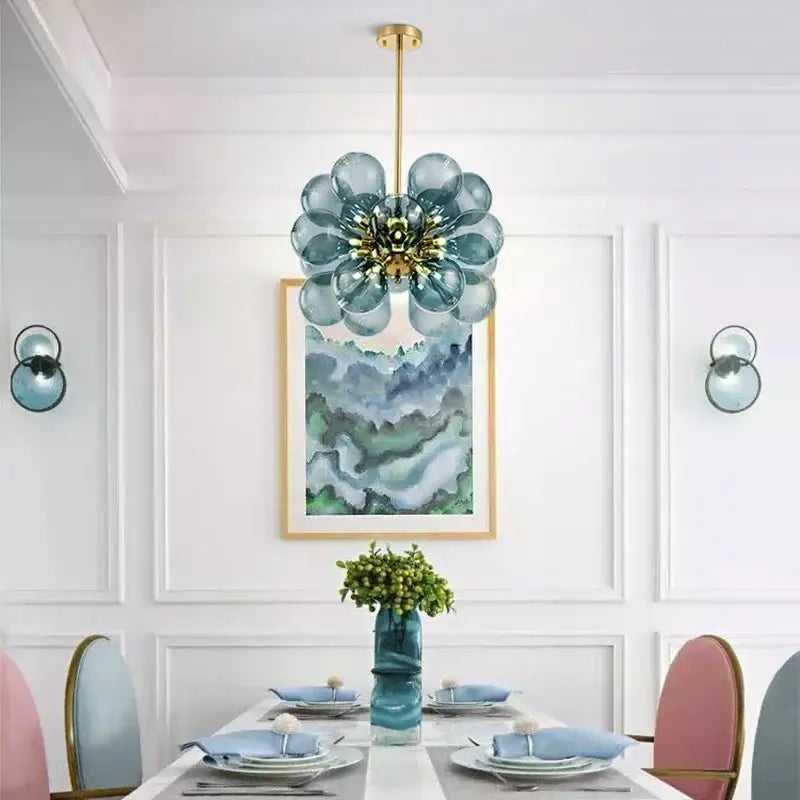 Modern teal and brass glass bubble chandelier pendant light with floral patterned spherical bulbs for living room decorbites