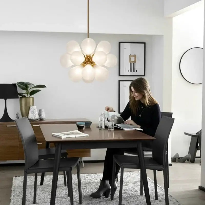 Modern pendant light with gold-toned fixture and frosted glass bubble hanging globes for dining room decorbites glass bubble