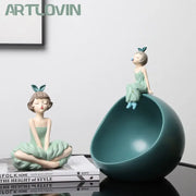 Modern teal ceramic bowknot girl figurine and smaller sitting figurine on egg-shaped bowl for living room storage sculpture