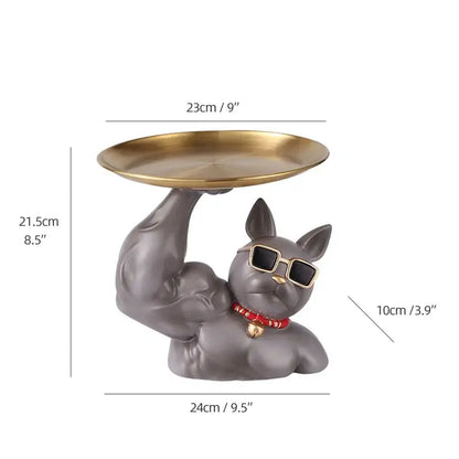 Gray sculpted decorbites bulldog tray figurine with muscular arms wearing teal sunglasses and holding a gold circular tray
