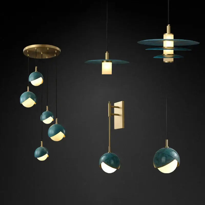 Modern teal glass and brass pendant light with globe design for kitchen island featuring decorbites blue copper accents