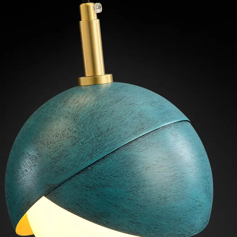 Modern teal glass pendant light with textured matte finish and brass fixture ideal for kitchen island decorbites blue copper