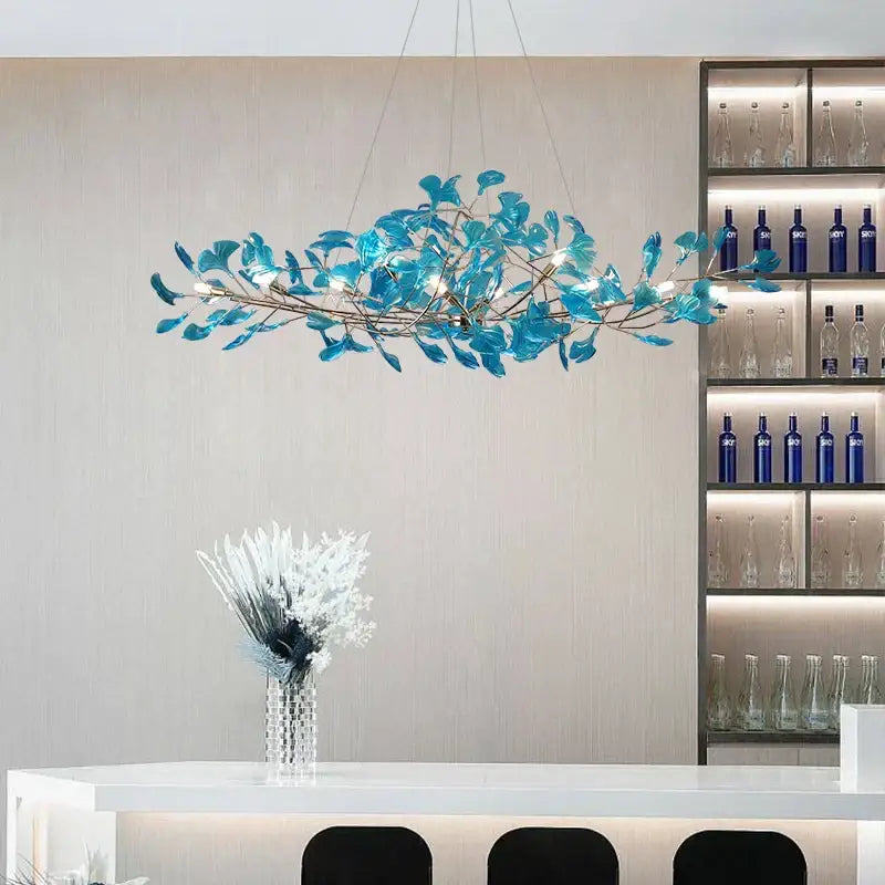 Modern teal glass gingko leaf chandelier with integrated lighting from decorbites for dining room art decor