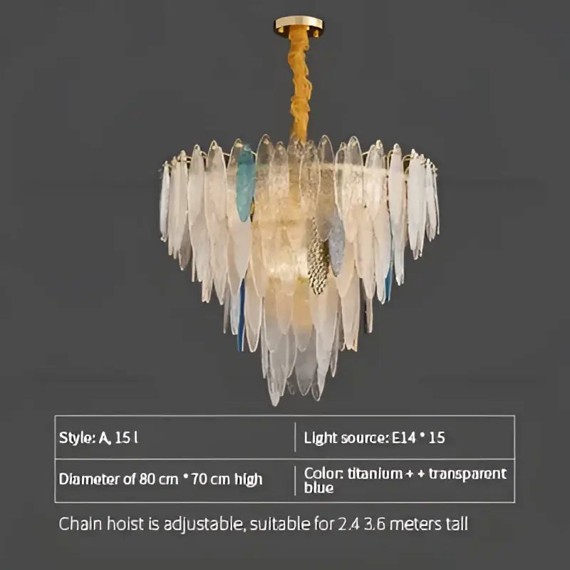 Modern teal and gold glass chandelier light with cascading translucent glass shards in titanium and blue hues for living room