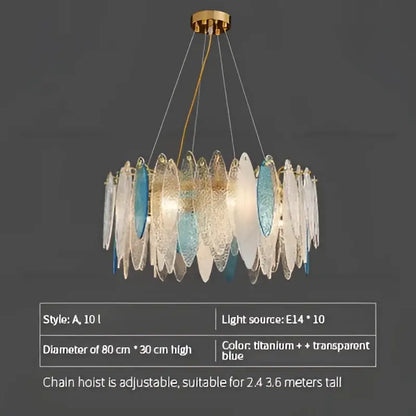 Modern teal and gold glass chandelier light with layered translucent blue and clear glass leaf shades for living room