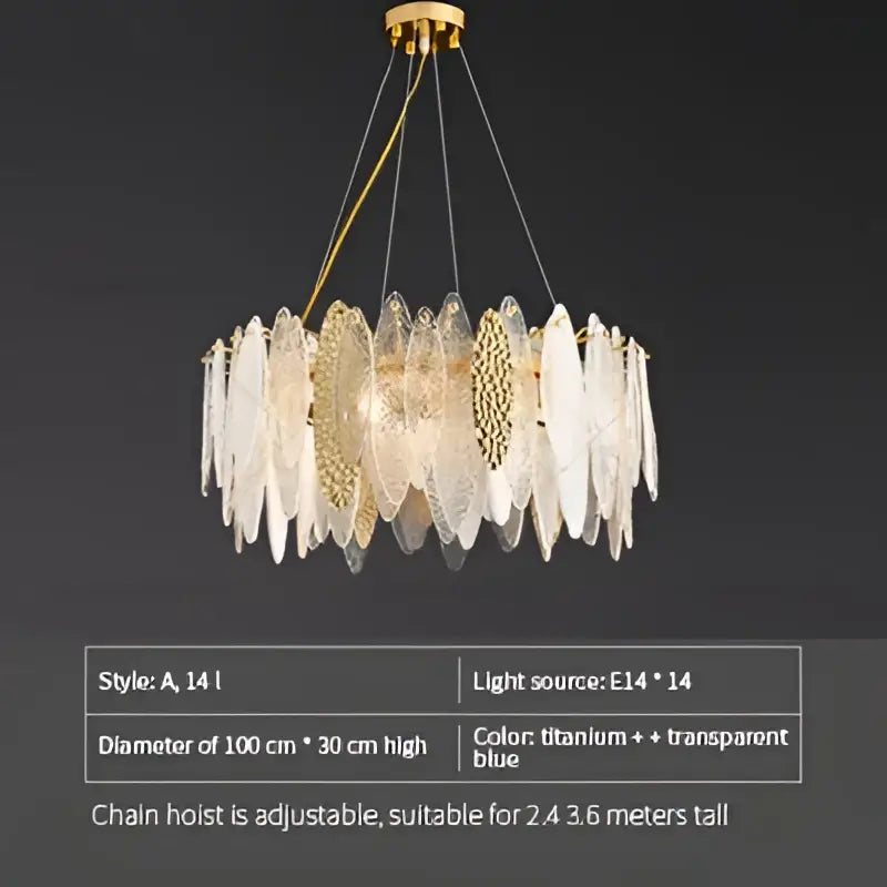 Modern teal and gold glass chandelier light with translucent blue and clear crystal discs for living room use