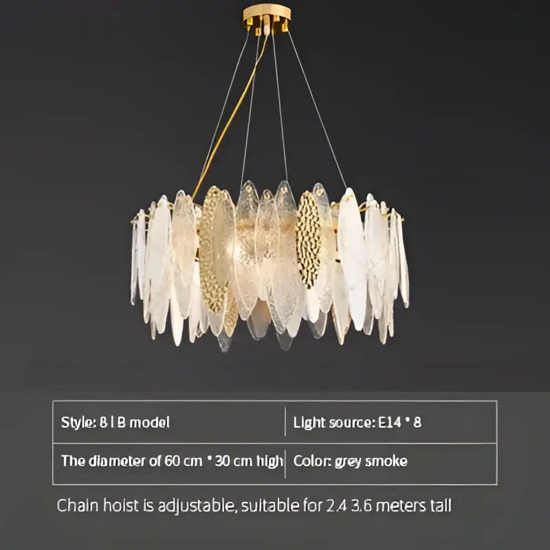 Modern teal and gold glass chandelier light with translucent grey smoke glass discs for elegant living room decor