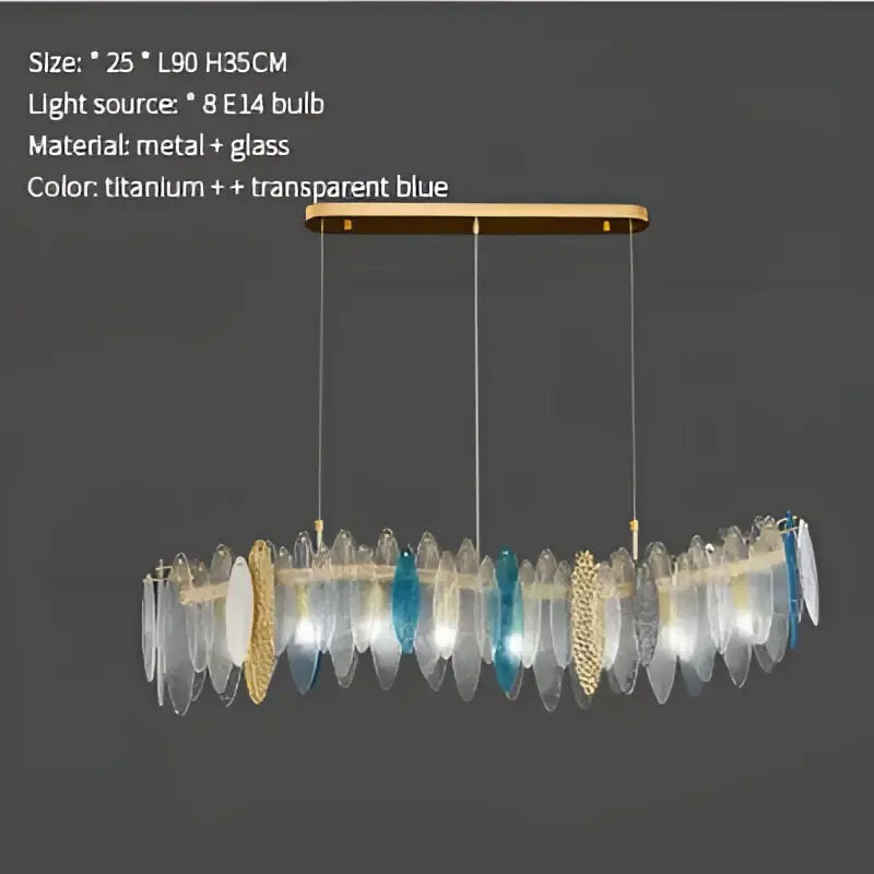 Modern teal and gold glass chandelier light featuring a gold metal frame with hanging transparent blue glass shards