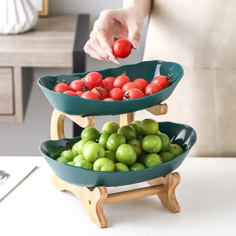 Modern teal ceramic two-tier layer table plates with wooden legs and curved bowl design for dining room use