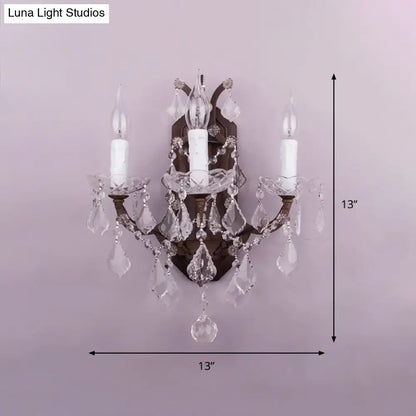 Antique bronze-finished modern teardrop wall lamp with clear crystal droplets for living room lighting