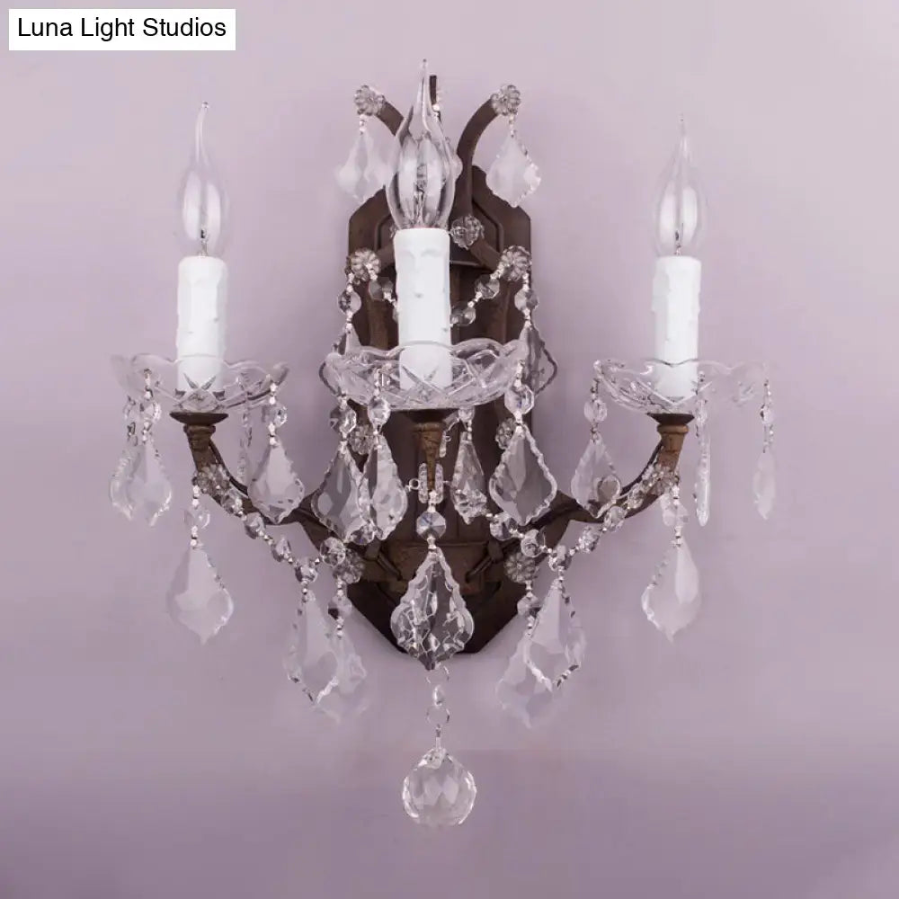 Antique-style crystal chandelier with dark bronze frame and clear faceted droplets for modern teardrop wall lamp use