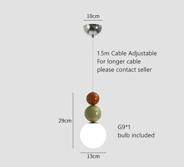 Modern three-tiered pendant lights with colorful ball glass shades in terracotta, sage green, and clear white for living room decorbites colorful ball