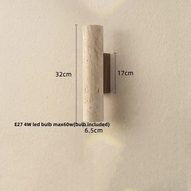 Modern terrazzo concrete led wall sconce with sleek cylindrical stone design and natural beige gray veined texture on bronze bracket