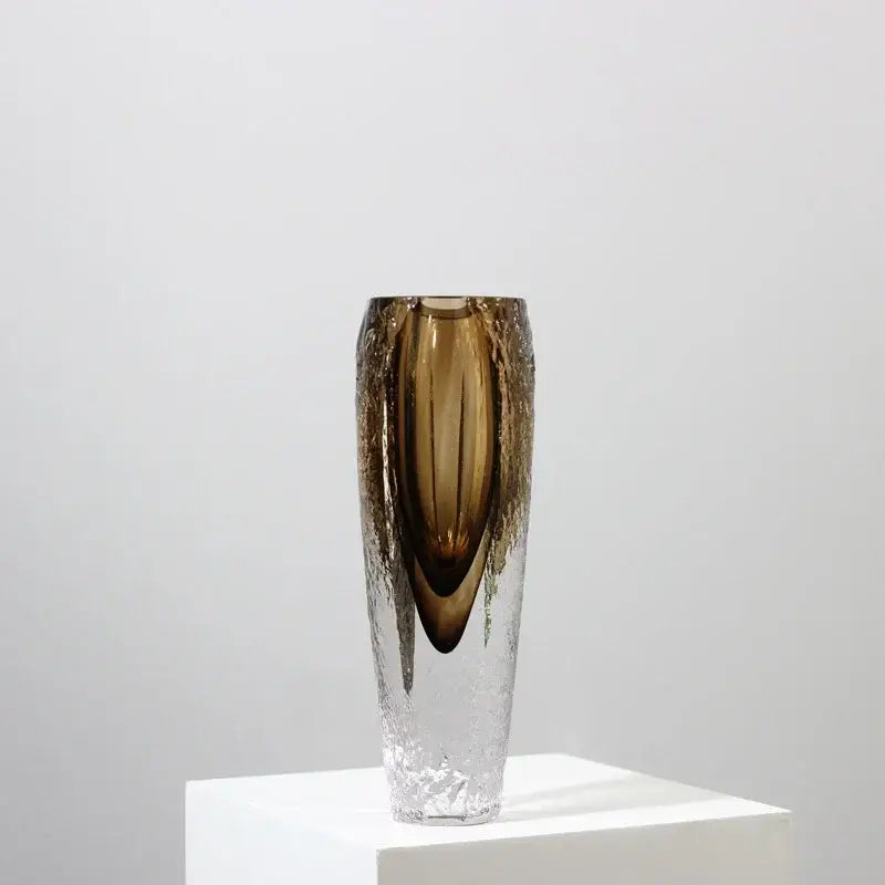 A tall slender brown glazed glass vase with textured amber section ideal for modern living room decorbites decor