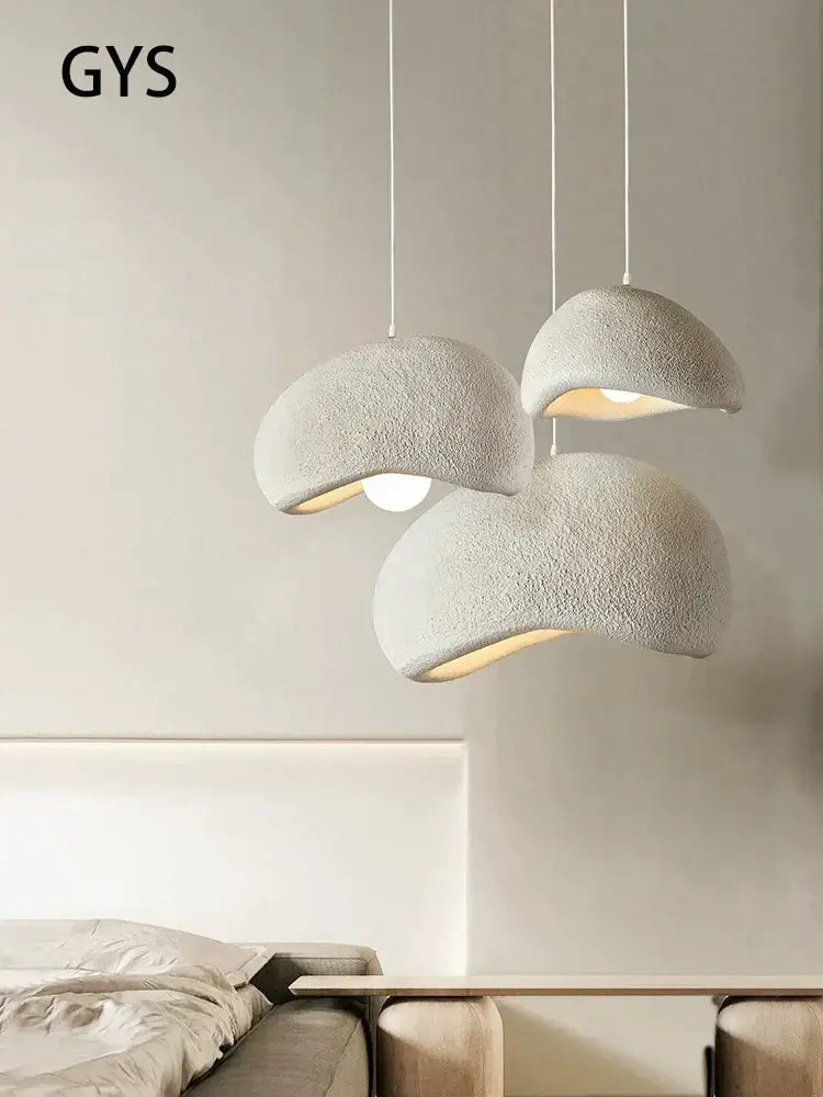 Three off-white textured pendant lights with a cream cloud chandelier design for dining room decorbites cream cloud