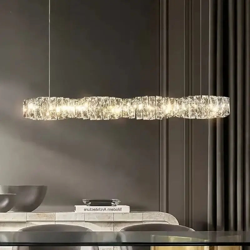 Modern textured crystal led pendant light with clear faceted segments providing warm illumination for dining room decorbites crystal led pendant lights