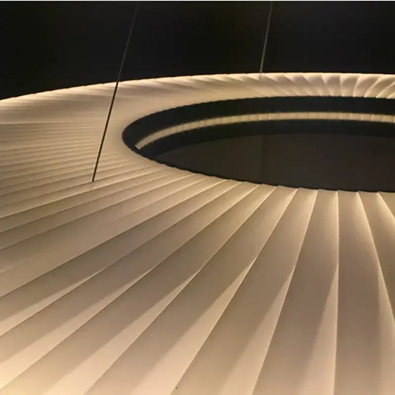 Modern textured dix heures round fabric led pendant light with white ribbed design and black accent ring for dining room