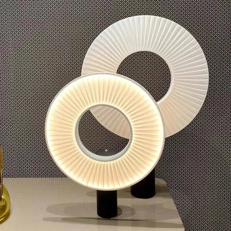 Modern white pleated dix heures round fabric pendant light with warm led lighting and black cylindrical bases for dining room