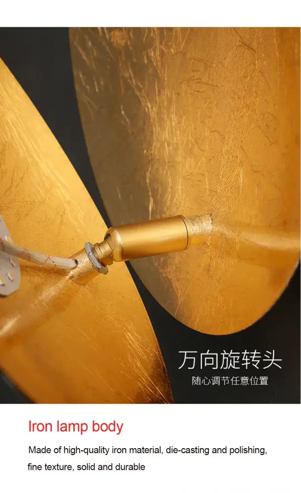 Modern textured eclipse round wall lamp with golden iron body polished finish and adjustable rotating head for bedroom