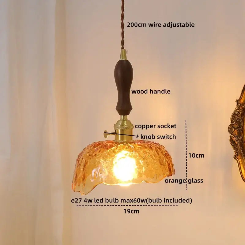 Modern textured glass copper led pendant light with warm orange shade, dark wood handle, and brass copper socket for kitchen
