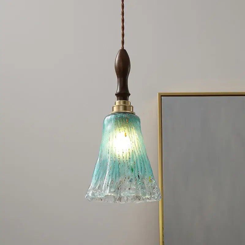 Teal gradient glass copper led pendant light with textured ribbed design and dark wood finish for kitchen dining room