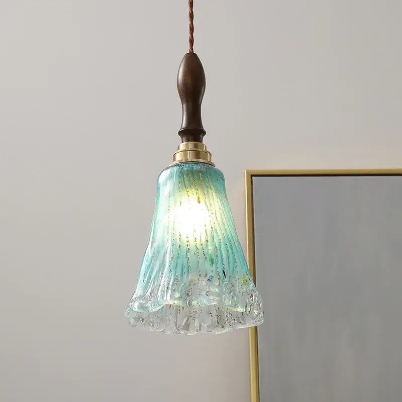 Modern textured turquoise glass copper led pendant light with ribbed design and dark wood top for kitchen dining room