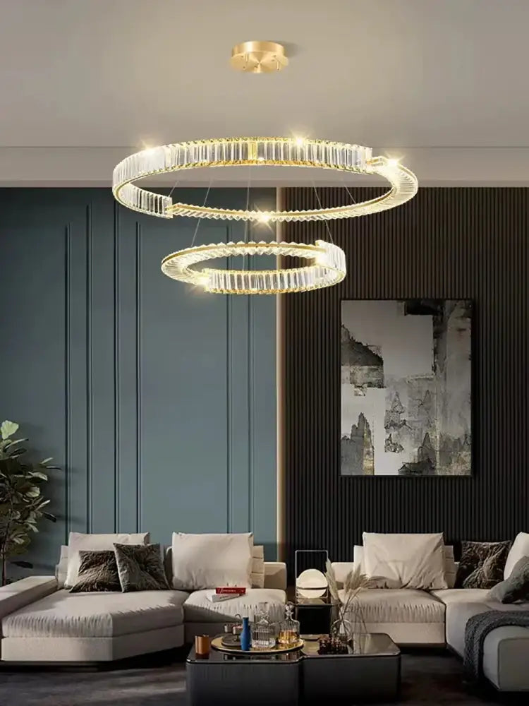 Modern double-tiered chandelier with gold ring led frame and decorbites crystal gold accents for dining room decor