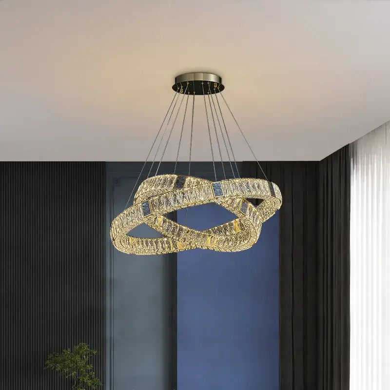 Modern three tier crystal golden led ring chandelier with interlocking rings and blue accents for dining room decorbites golden led