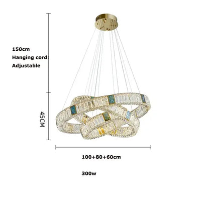 Modern three tier crystal golden led ring chandelier with three interlocking crystal rings adorned with blue and clear crystals decorbites golden led